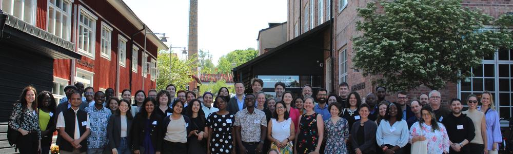 A group photo of 60 people at a GLD conference in Sweden.