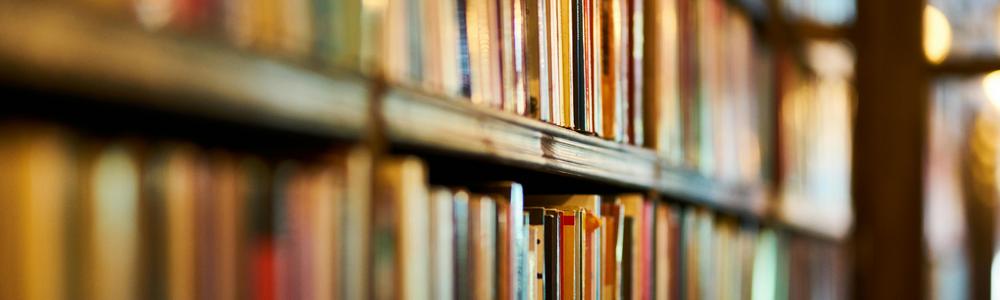 A book shelf in a library.